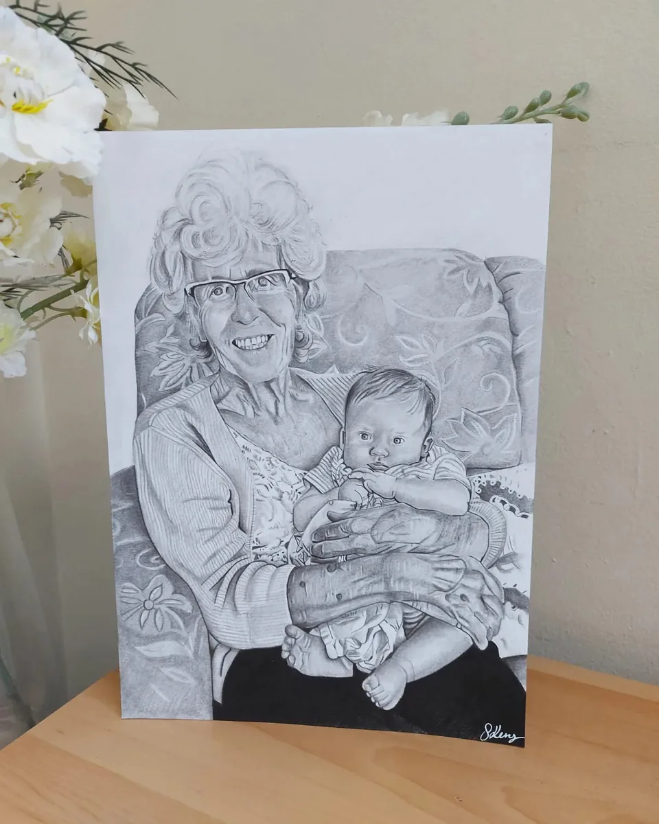 Pencil portrait commission of grandmother and grandchild