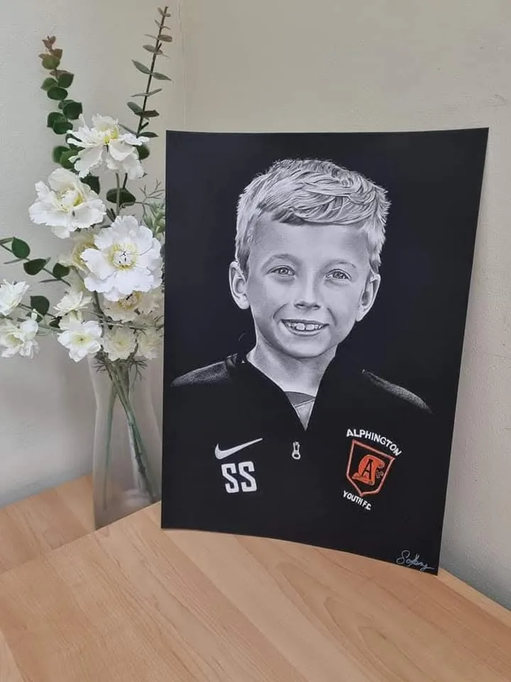 Pencil portrait commission of a young boy