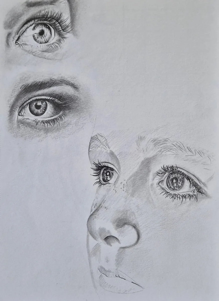 Pencil portrait sketch of a boy, close-up of eyes