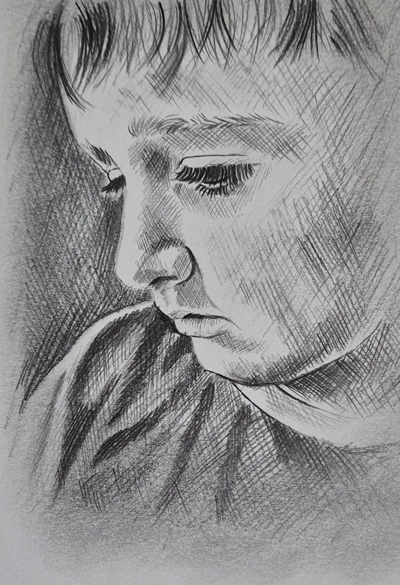 Pencil sketch portrait of a young boy
